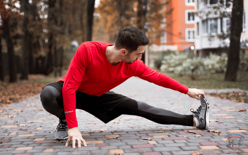 a person doing light warm-ups or basic bodyweight exercises.