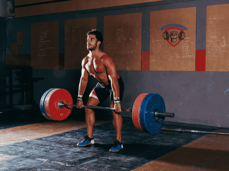 Athlete performing deadlift with barbell