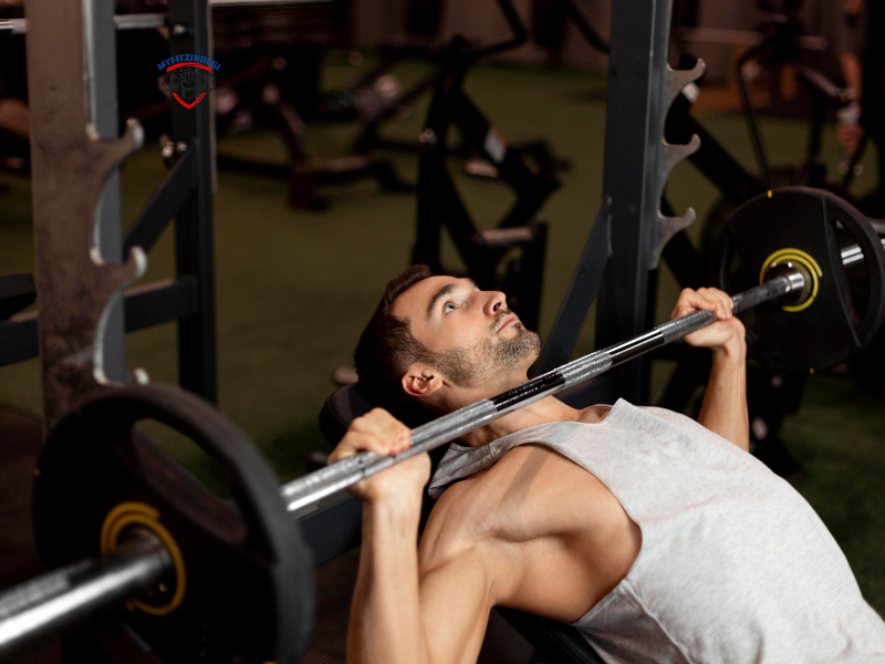 Barbell bench press exercise for chest, shoulders, and triceps