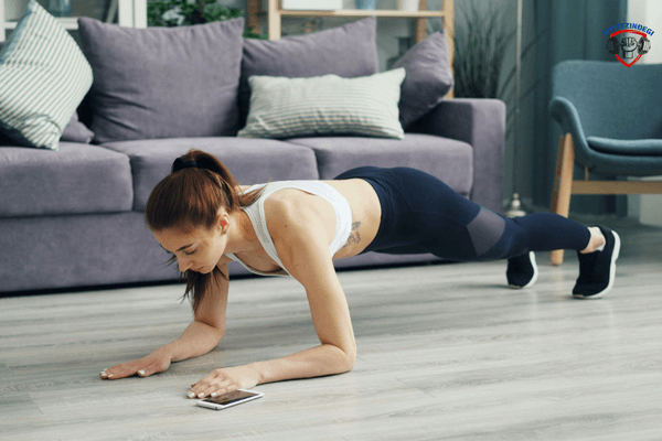 woman doing home plank workout