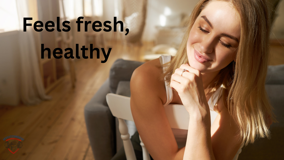 A woman stretching her arms up with a small smile — like she finally feels fresh after days of fatigue.
Perfect for the “energy boost” section.